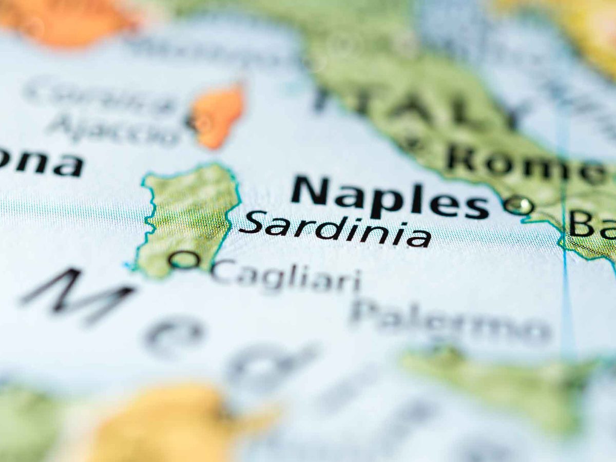 Traditional Sardinian ingredients — semola flour, pecorino cheese, fresh herbs, and handmade pasta